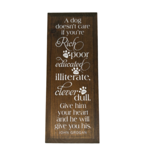 A Dog Doesn’t Care" Sign – Quote by John Grogan